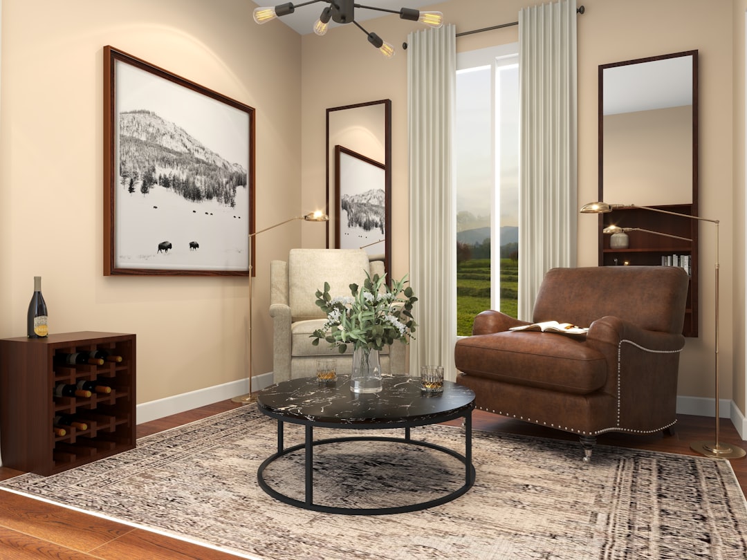 Home brown-sofa-near-glass-round-table-hfolioca-v0